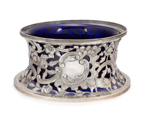 An Edwardian Irish silver dish ring,&nbsp;Edmund Johnson, Dublin, 1904;&nbsp;The sides pierced and embossed with various scen