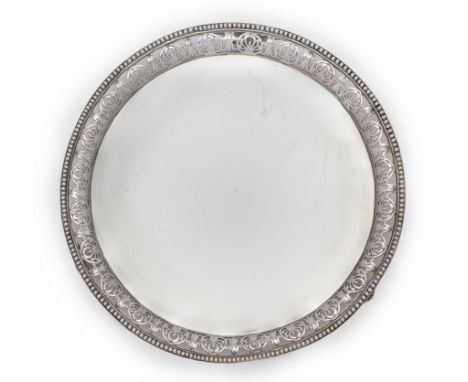 A George III silver salver with pierced and beaded border.  John Crouch I & Thomas Hannam, London, 1776;    Of circular form,