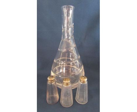 Glass decanter and 3 silver topped small bottles