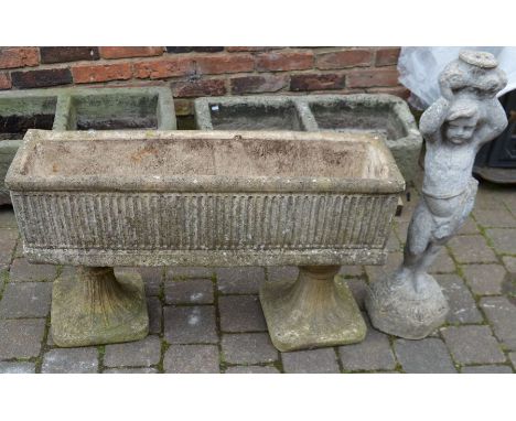 Raised concrete planter &amp; a statue&nbsp;