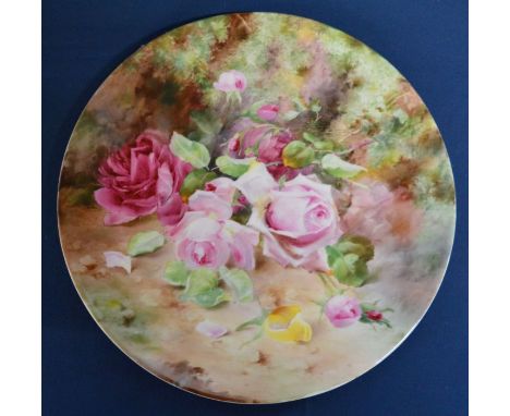 Royal Worcester charger decorated with hand painted roses. Dia 30.5cm