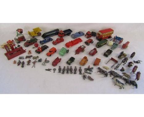 Collection of vintage toys includes figures, animals, cars - Dinky, Chad Valley, etc