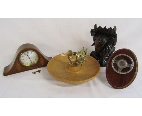 8 day mantel clock with inlaid decoration, ships wheel nut cracker, wooden carved heads and mounted steering wheel