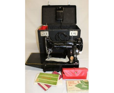 Singer electric sewing machine, model 222K, in original box with papers &amp; accessories