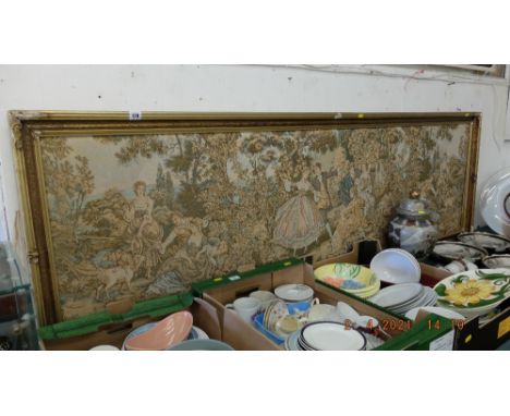 A large framed tapestry garden scene, frame has some damage