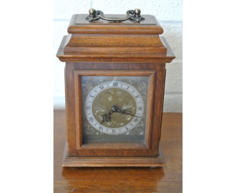 A 20th century mantle clock with 8 day movement by Rotherhams platform balance escapement, brass/silvered dial - working in s