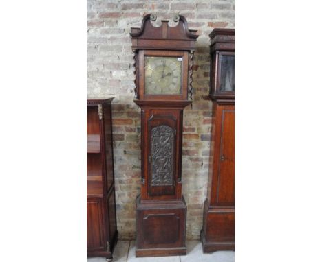 An 18th century oak 30 hour longcase clock with a 12" square brass dial signed J Stancliffe Barkisland with moon phase and ca