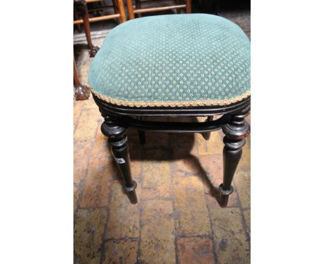 A Victorian ebonised mahogany green/gold upholstered stool