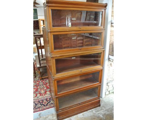 A walnut Globe Wernicke five section stacking bookcase - Height 183cm x 87cm - top two sections 25cm deep, three base section