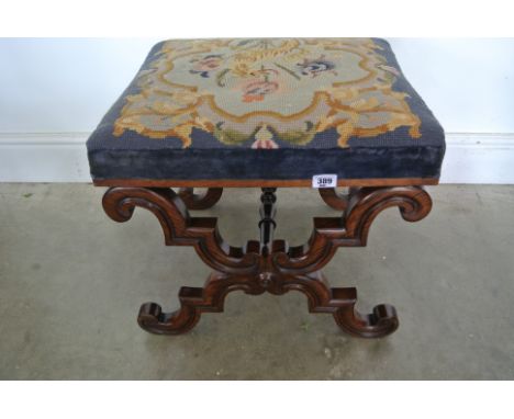 A Regency rosewood X frame stool with needlepoint seat