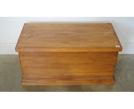 A modern pine trunk with metal handles and hinged lid - 86cm x 43cm x 43cm high - made by a local craftsman to a high standar