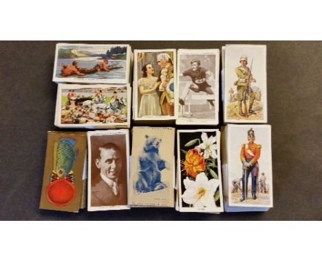 MIXED, complete (10), inc. Carreras (4), Army/Naval Uniforms, Zoo Animals (Turf); Churchmans (3), Boxing Personalities, Story