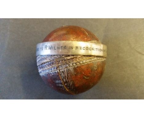 CRICKET, presentation ball with silver-plated band, "Presented to R. Milner in recognition of Sept 24th 1909", band loose, FR