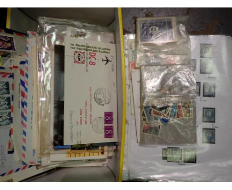 A quantity of mixed world stamps, loose and on paper, and first day covers. UK P&P Group 1 (£16+VAT for the first lot and £2+
