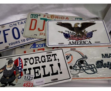 Eight tin plate signs, including American licence plates. UK P&amp;P Group 1 (£16+VAT for the first lot and £2+VAT for subseq