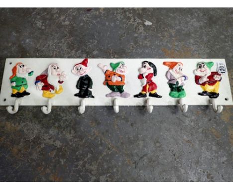 Cast iron seven dwarves cup rack, L: 60 cm. UK P&amp;P Group 3 (£30+VAT for the first lot and £8+VAT for subsequent lots) 