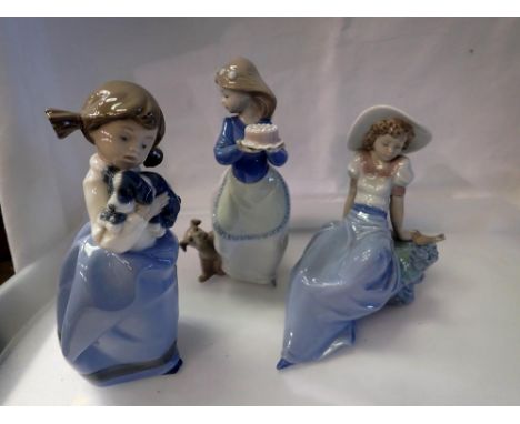 Three Nao figurines. UK P&amp;P Group 3 (£30+VAT for the first lot and £8+VAT for subsequent lots) 