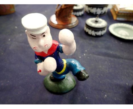 Cast iron Kung Fu Popeye figurine. H:12cm. UK P&amp;P Group 1 (£16+VAT for the first lot and £2+VAT for subsequent lots) 