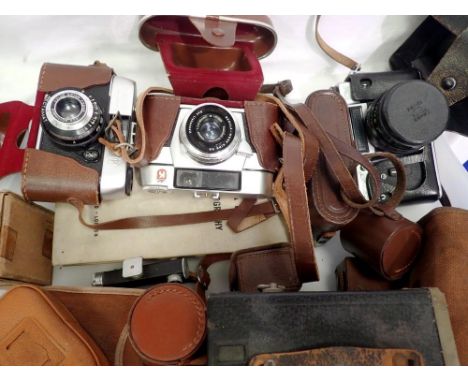 Collection of cameras, to include Zenit, most with cases. UK P&amp;P Group 3 (£30+VAT for the first lot and £8+VAT for subseq