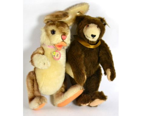 A modern Steiff limited edition rabbit, 'Niki 1952 Replica', tag numbered 02878, 35cm high together with a modern Steiff limi