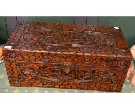 A carved camphor wood trunk 