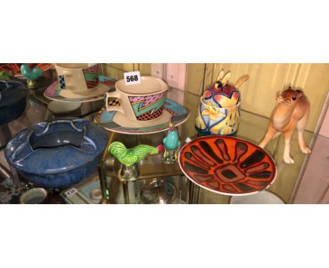 ROSENTHAL MEMPHIS STYLE TEACUP AND SAUCER, TUPTONWARE BY JEANNE MACDOUGALL TUBE LINED HONEYSKEP AND COVER, A CAMEL FIGURE AND