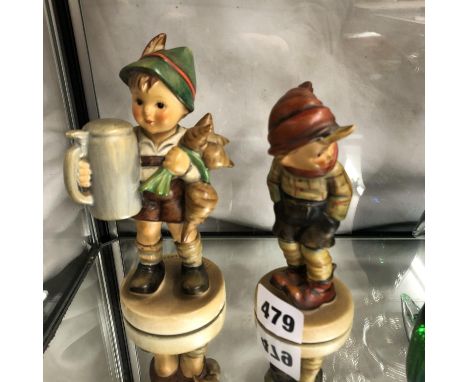 TWO HUMMEL FIGURES OF BAVARIAN BOYS (SLIGHT CHIP TO ONE HAT)