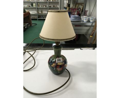 ORCHID: A Walter Moorcroft Pottery china glazed baluster shaped lamp base, impressed markings to base (16cm high).