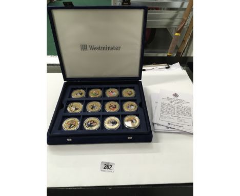 Three boxed sets of commemorative coins; The Queens Diamond Wedding, Photographic Portrait collection and the Cook Islands.
