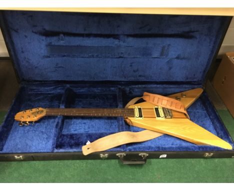 A power sound high super gain super pick up electric guitar in pine case with brass mounts and carrying case