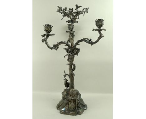 A Victorian silver plated three branch candelabra, Elkington & Co, circa 1860, cast with a sheep and a ram on a rocky base, t