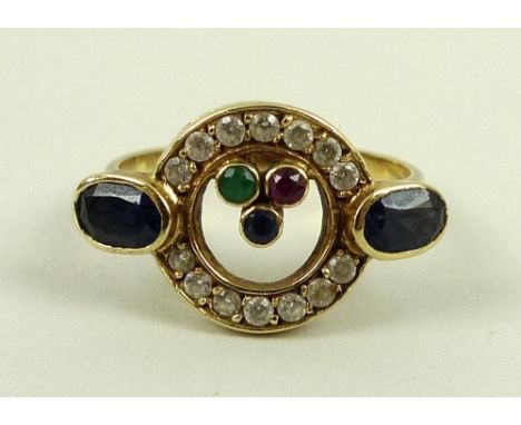 An Art Deco style 14ct gold ring set with sapphires, emerald ruby and paste stones, 4g, size R/S.