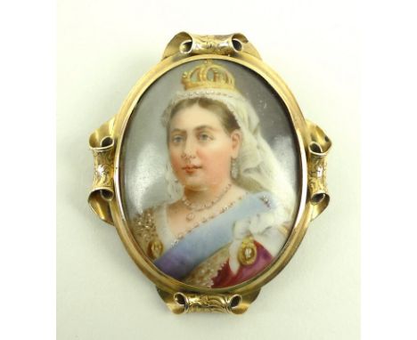 An unmarked gold mounted porcelain portrait brooch of Queen Victoria, 6cm by 4.5cm.