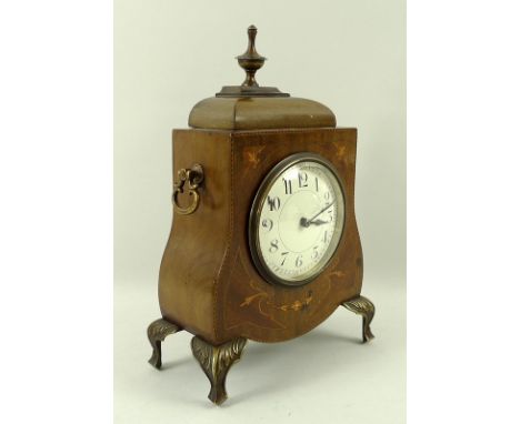A French marquetry inlaid mantel clock, the white face with Arabic numerals, with cast brass fittings, with key, 17 by 9 by 2