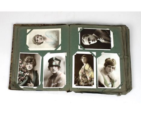 An album of Gladys Cooper and early 20th century topographical and portrait postcards including a large collection of origina