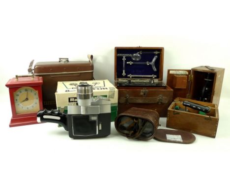 A group of collectables comprising a Bell and Howell cine camera, complete with case and instructions, an Everay Violet Ray A