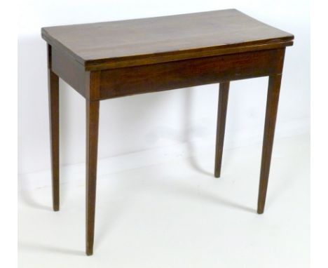 A Regency mahogany and inlaid card table, fold out surface with green baize, raised on slender tapering legs, 81 by 40 by 73c