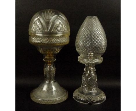 A cut glass table lamp of torch shape, 31cm, and another similar with round shade, 3cm, both on flared bases. (2)