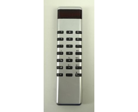 A 1976 Sinclair Sovereign Calculator, designed by John Pemberton, the brushed pressed steel case, with black button numerals 
