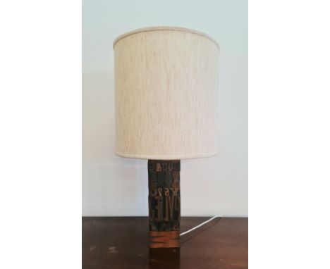 A 1960s printing block table lamp and shade.