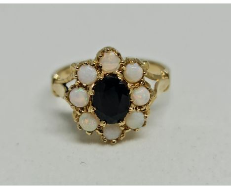 A hallmarked 14ct yellow gold sapphire and opal cluster ring, ring size M½.