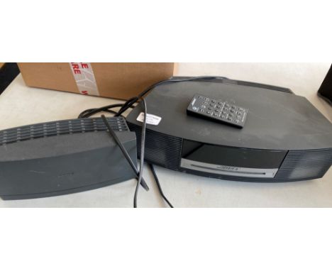 A BOSE Model AWRCC5 CD Player.