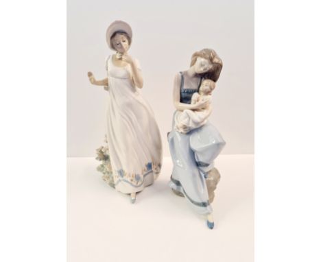 Two large Nao figures Mother and child and lady with bonnet.