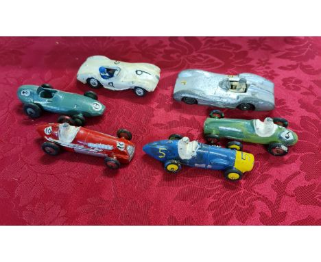 Two Crescent Toy Co racing cars together with four Dinky Toy racing cars repainted.