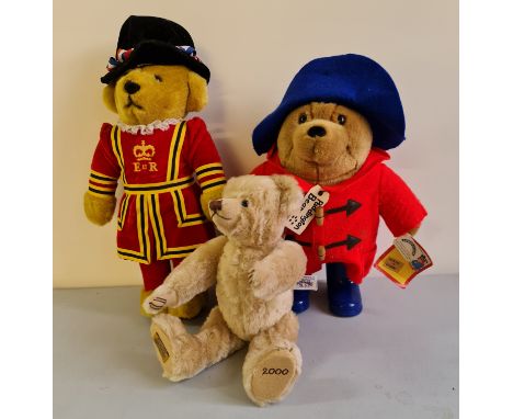 A Merrythought 2000 teddy bear beefeater and Paddington bear.