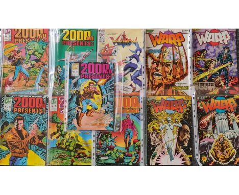 Eleven comics to include Modern Voltron 2, QC 2000ad 17,20,21,22,25,26, First comics Warp 6,7,8, and 9.