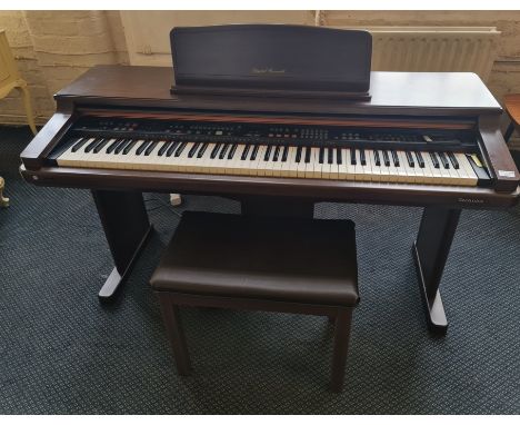 A Technics 'Digital Ensemble' electric piano with stool, model number PR350.