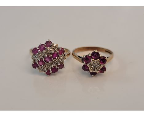 Two hallmarked 9ct yellow gold ruby and diamond cluster rings, one a flower cluster design, the other of hexagonal design,