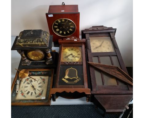 Five various wall clocks and a slate effect mantle clock.