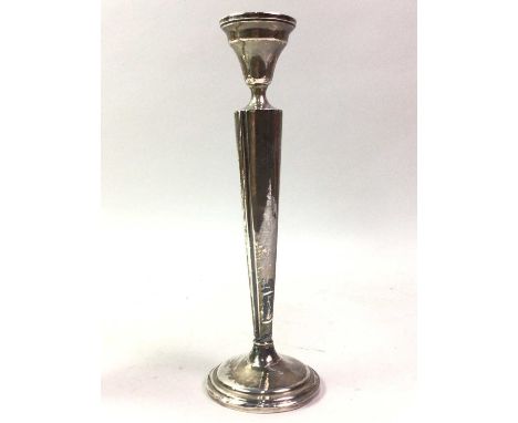AMERICAN SILVER CANDLESTICK, ALONG WITH A SILVER VASE the candlestick of tapered oval form with circular base, the vase maker